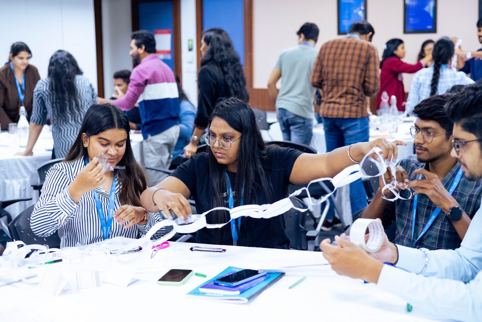 Team activity with paper chains at a workshop