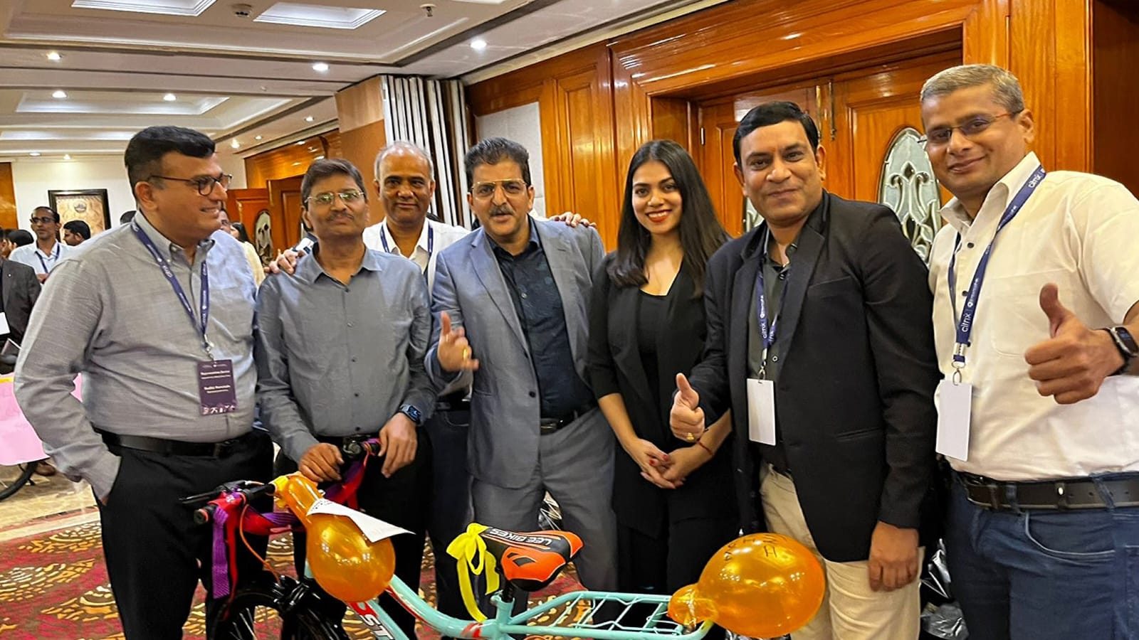 Group photo with guests at a corporate celebration